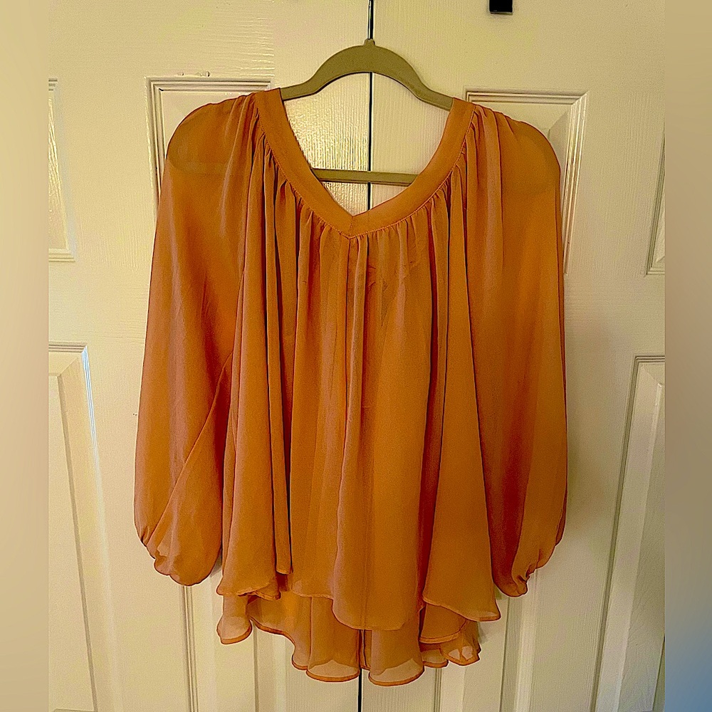 Peach blouse with bow